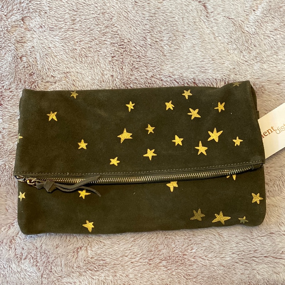 Dark green clutch with gold stars